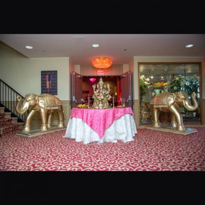 pink table with gold elephants